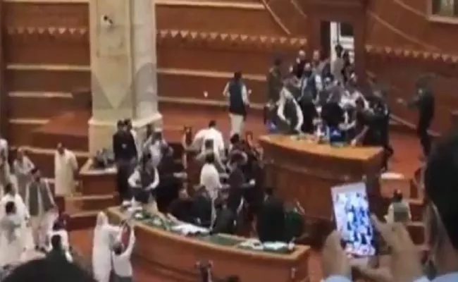 Pakistan Assembly Turned Into Battle Zone - Sakshi