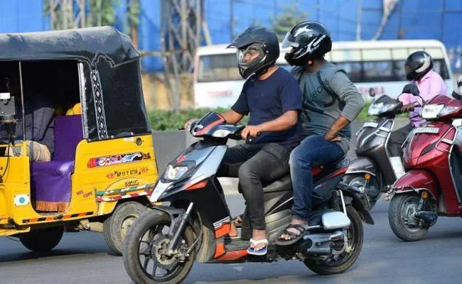 Male Pillion Riders Banned In Kerala Palakkad - Sakshi