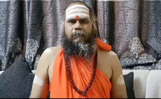 Swami Vairagyanand Giri Arrested Attempt Molestation Woman Devotee - Sakshi