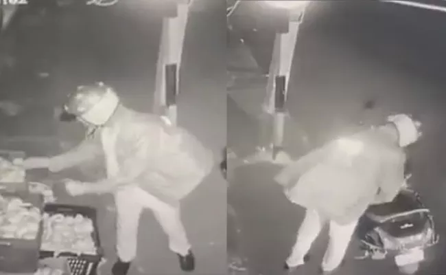 Kerala Police Man Stole Mangoes Video Viral Suspended - Sakshi