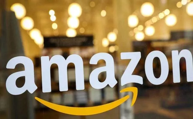 Massivie job cuts internet giant Amazon about 10k employees - Sakshi