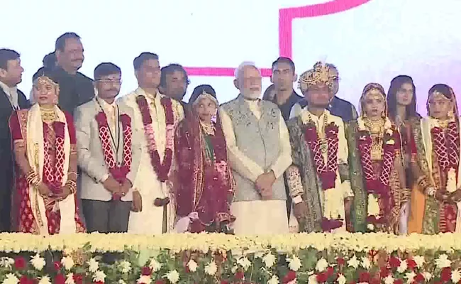PM Narendra Modi Attended A Mass Wedding Ceremony In Gujarat - Sakshi