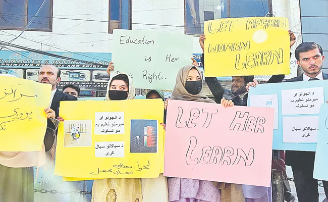 Afghan women protest against Taliban ban on higher education for female students - Sakshi