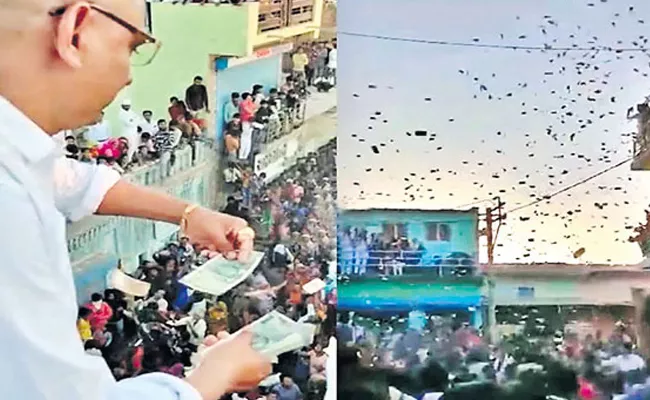 Gujarat Sarpanch Showers Rs 500 Notes from Terrace Viral Video - Sakshi