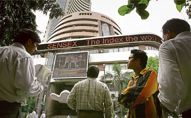 Indices Trade Lower With Nifty Around 17,338 - Sakshi