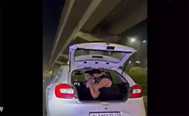 Gurugram Man Showering Cash From Running Car  - Sakshi