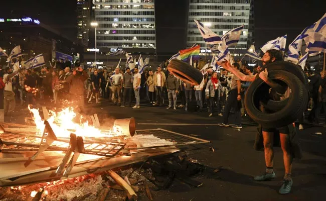 Israel Massive Protests Over Pm Benjamin Netanyahu Judicial Reforms - Sakshi