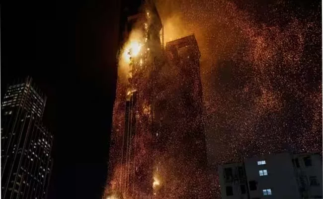 Hong Kong Skyscraper Consumes Fire Video Goes Viral - Sakshi