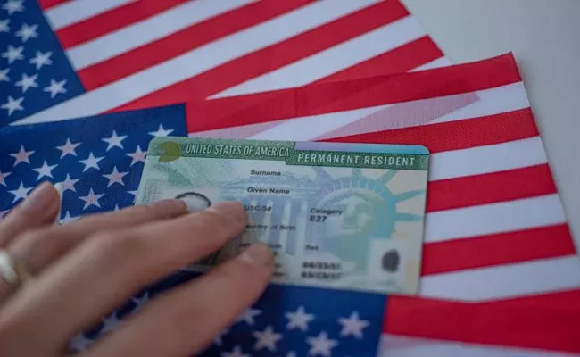 US lawmakers to remove the 7 per cent country limit on green cards - Sakshi