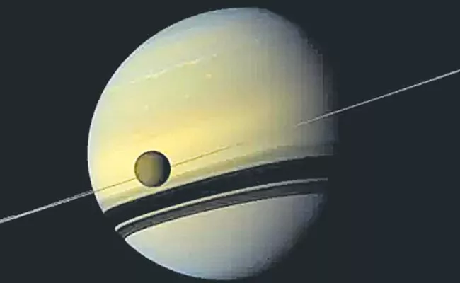 Saturn is the new Moon King of the solar system - Sakshi