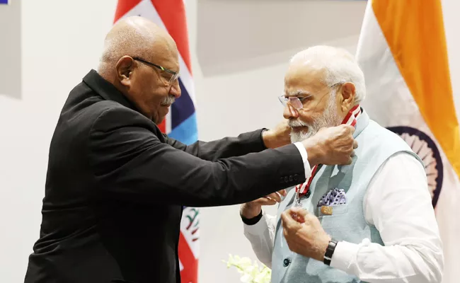PM Narendra Modi Conferred with the highest honour of Fiji - Sakshi