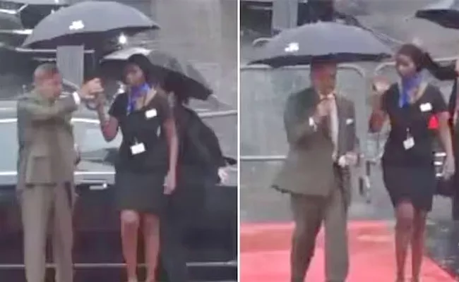 Pak PM Trolled After Video Shows Him Snatching Umbrella From Woman Officer - Sakshi