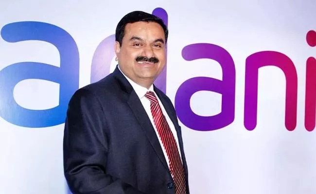 Adani Group repays loans worth 2.65 billion dollars to complete prepayment programme - Sakshi