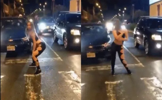 girl dancing on busy road video viral - Sakshi