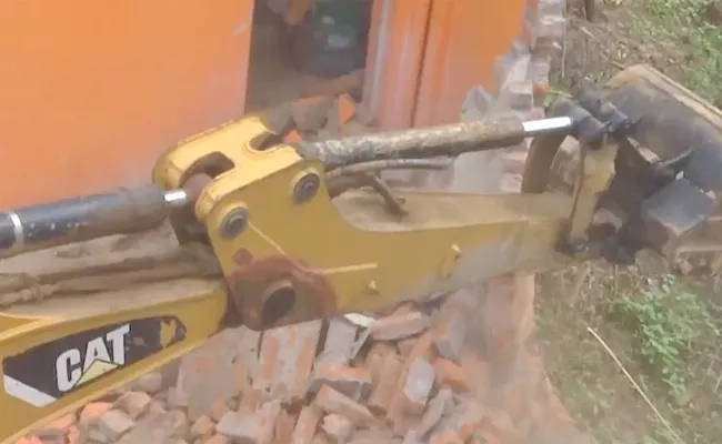 Bulldozer Action Against A Man who Urinated on Tribal Labourer In Madhya Pradesh - Sakshi
