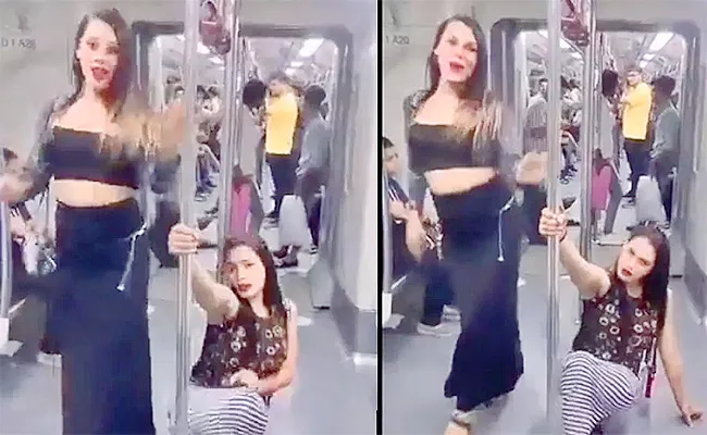 Video Of Two Women Pole Dancing Inside Delhi Metro - Sakshi