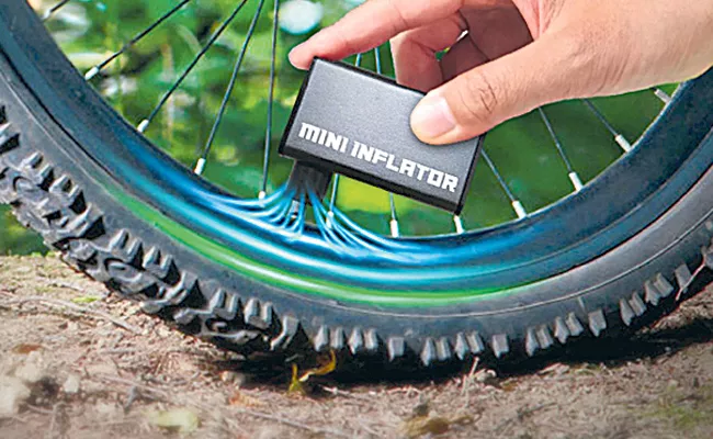 How To Use Mini Pump Tool For Quick Tyre Inflation - Sakshi
