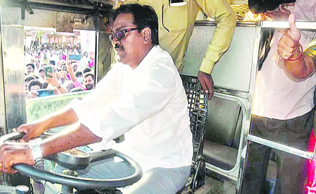 Ajay Kumar sat in the bus driver seat - Sakshi