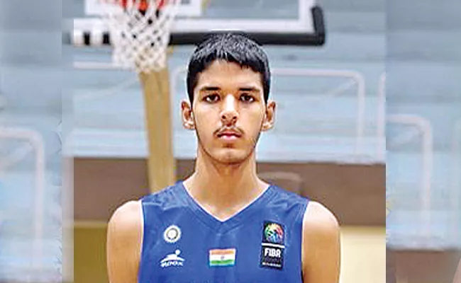 Aryan in the Indian basketball team - Sakshi