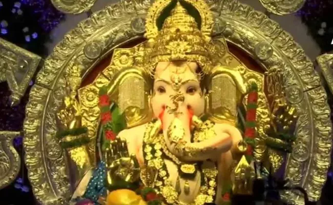 Richest Ganesha idol in Mumbai adorned with 69 kg gold 336 kg silver - Sakshi