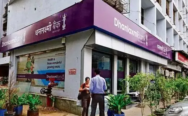Dhanlaxmi Bank shares fall after independent director quits - Sakshi