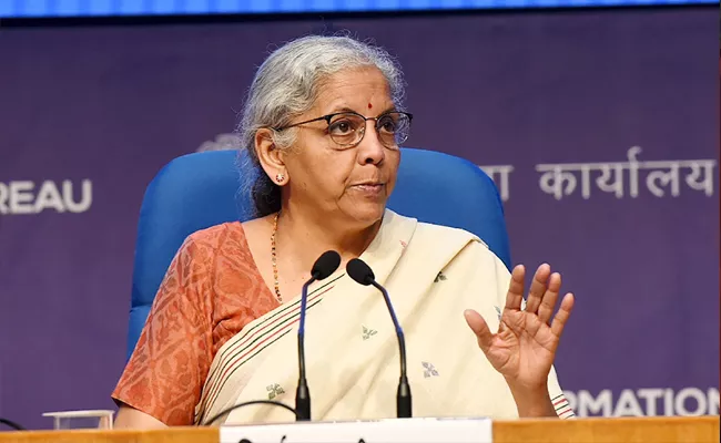 Government Working On Ways To Lower Debt Burden Said Nirmala Sitharaman - Sakshi