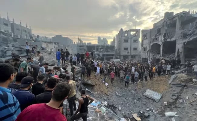 Hamas commander, Several Killed As Israel Bombs Biggest Refugee Camp In Gaza - Sakshi