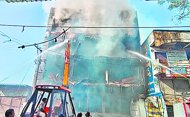 Fire At Ayyappa Shopping Mall In Kamareddy - Sakshi