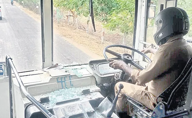 Government bus use driver  helmet   - Sakshi