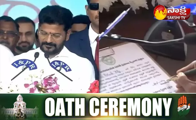 Revanth Reddy First Signature after Takes Oath as Telangana CM