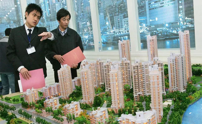 Chinas Real-Estate Crisis: Buy A House Get A Wife For Free - Sakshi