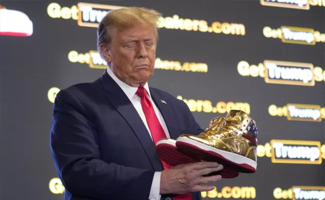 Trump Autographed The Golden Shoes Auctioned Off - Sakshi