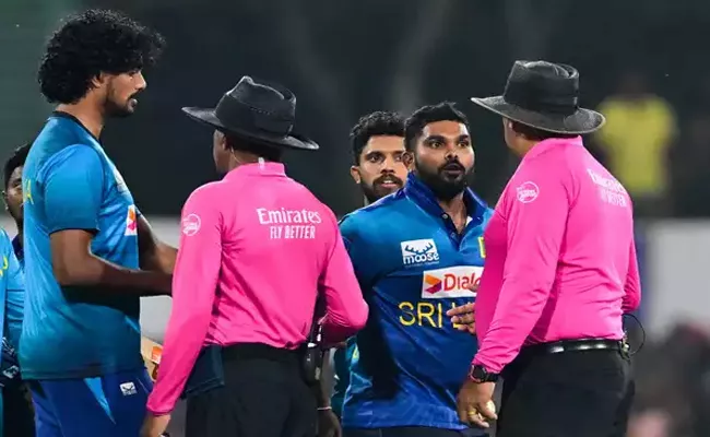 Hasaranga Handed Two Match Suspension For Slamming Umpire In A Match Vs Afghanistan - Sakshi