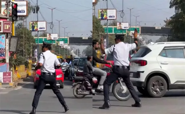 Policeman Seen Controlling Traffic in Dancing Style - Sakshi