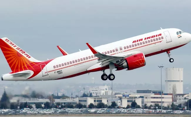 Air India Flights Avoid Iranian Airspace Amid Rising Tensions In West Asia - Sakshi
