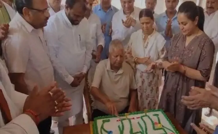 Lalu Yadav Cuts a 77 Pound Cake