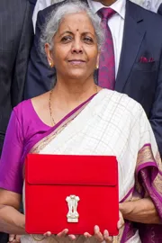  FM Nirmala Sitharaman elegant white and magenta saree for historic 7th Budget