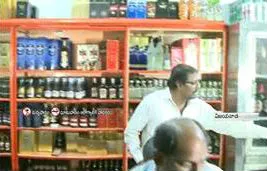 fake liquor hulchul in vijayawada - Sakshi
