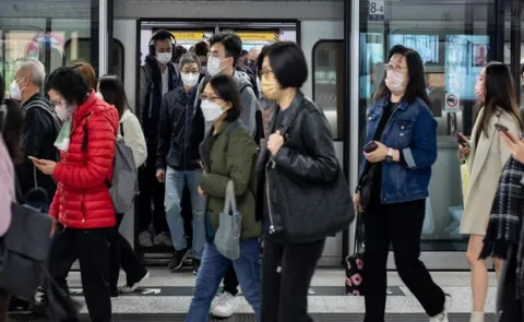 Covid-19 cases spike in Hong Kong, Singpore15