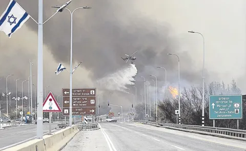 Israel battles worst wildfires in country history12