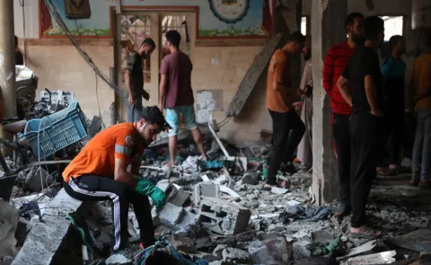 Israeli strike kills dozens sheltering in Gaza school, officials