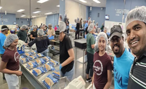 Feed My Starving Children Nats jointly prepared food kits to poor children5
