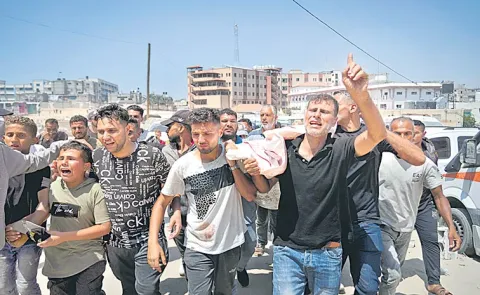 Israeli forces open fire at Gaza food sites, killing at least 5 Palestinians13