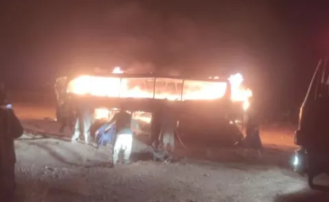Afghanistan bus carrying migrants crashes catches fire