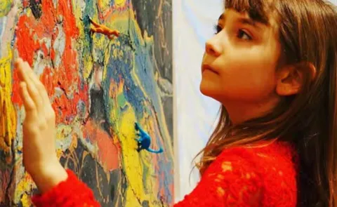 Aelita Andre an Australian born abstract painter earning money