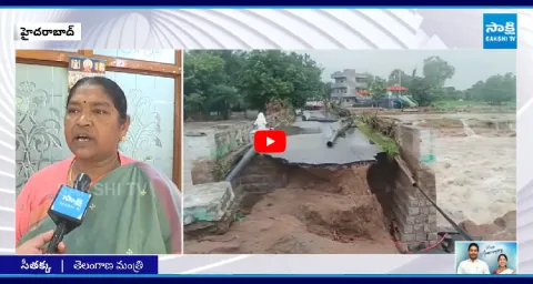 Minister Seethakka And Collector Help Flood Victims