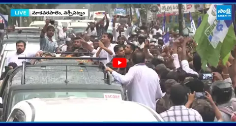 Massive Crowd With YS Jagan In Heavy Rain9