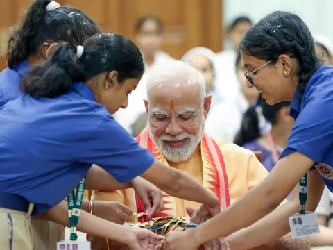 Prime Minister Narendra Modi celebrates Raksha Bandhan with kids Photos