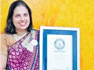 గిన్నిస్ స్కార్ఫ్... - Sakshi