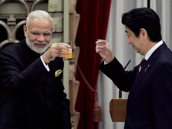 PM Modi congratulates 'dear friend' Abe on election win - Sakshi